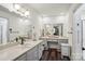 Bathroom featuring dual sinks, ample counter space, with wood flooring and a large mirror at 2297 Blossom Dr, Rock Hill, SC 29730