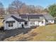 Charming home with mature landscaping and solar panels on a spacious lot at 2297 Blossom Dr, Rock Hill, SC 29730