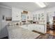 Classic kitchen with granite counters, white cabinets, and stainless steel appliances at 2297 Blossom Dr, Rock Hill, SC 29730