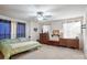 Serene main bedroom featuring soft green bedding, neutral walls, and warm lighting at 2297 Blossom Dr, Rock Hill, SC 29730