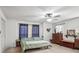 Bright main bedroom featuring neutral walls, soft carpet, and ample closet space for storage at 2297 Blossom Dr, Rock Hill, SC 29730