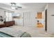 Bright main bedroom with white walls, wall mounted tv, closet, and a comfortable bed at 2297 Blossom Dr, Rock Hill, SC 29730