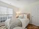 Bright bedroom features a window and decor at 2405 Ivy Run Dr, Indian Trail, NC 28079