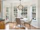 Bright dining area featuring hardwood floors and natural light at 2405 Ivy Run Dr, Indian Trail, NC 28079