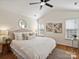 Spacious bedroom features a ceiling fan, natural lighting, and hardwood floors at 2405 Ivy Run Dr, Indian Trail, NC 28079