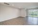 Expansive living room featuring sliding glass doors with access to the outdoors at 2656 Tillman St, Monroe, NC 28112