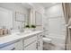 Clean bathroom with a vanity, tub-shower, framed mirror, and tasteful decor at 3218 Stelfox St, Charlotte, NC 28262