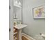 Charming bathroom with pedestal sink, decorative artwork, and a light, airy feel at 388 Luray Way, Rock Hill, SC 29730
