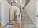 Bright foyer with staircase, wood floors, and neutral decor at 388 Luray Way, Rock Hill, SC 29730