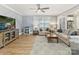 Living room features a large TV, ceiling fan, and comfortable seating at 388 Luray Way, Rock Hill, SC 29730