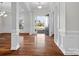 Bright foyer with hardwood floors, white trim, and an open view of the front yard at 4030 Ambleside Dr, Fort Mill, SC 29707
