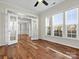 Spacious office with hardwood floors, glass paneled french doors, bright windows, and ample light at 4030 Ambleside Dr, Fort Mill, SC 29707