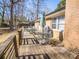 A partially covered back deck offers an open air place for relaxing and dining at 4455 Hampton Rd, Salisbury, NC 28144