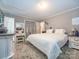 Primary bedroom with neutral colors, white furnishings and natural light at 4455 Hampton Rd, Salisbury, NC 28144