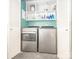 Bright laundry area features washer, dryer, and built-in shelving, creating a functional space at 4455 Hampton Rd, Salisbury, NC 28144