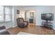 Cozy living room featuring hardwood floors, comfortable seating, and plenty of natural light at 4455 Hampton Rd, Salisbury, NC 28144