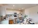 Well-lit kitchen with stainless steel appliances, granite countertops, and a charming island perfect for meal preparation at 5120 Fireweed Ct, Dallas, NC 28034