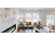 Cozy living room featuring a comfortable sofa, stylish decor, and a modern fireplace at 5120 Fireweed Ct, Dallas, NC 28034