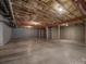 Unfinished basement with concrete floors and walls and exposed ceiling with insulation at 516 Appomatox Dr, Waxhaw, NC 28173