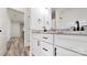 Modern bathroom featuring dual vanity with granite countertops and black hardware at 5311 Meadowland Pkwy, Monroe, NC 28112