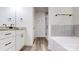 Bathroom featuring a walk-in shower and marble vanity at 5311 Meadowland Pkwy, Monroe, NC 28112
