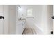 Well-lit bathroom boasts a sleek vanity, tub-shower combo, and natural light at 5311 Meadowland Pkwy, Monroe, NC 28112