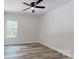 Inviting bedroom with large window, offering views and ample natural light at 5311 Meadowland Pkwy, Monroe, NC 28112