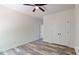 Bright bedroom with modern ceiling fan and neutral tones offers a calming retreat at 5311 Meadowland Pkwy, Monroe, NC 28112