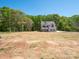 Picturesque two-story home with a well-maintained lawn, creating a peaceful and inviting curb appeal at 5311 Meadowland Pkwy, Monroe, NC 28112