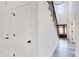 Welcoming foyer featuring staircase and elegant entry door, perfect for greetings at 5311 Meadowland Pkwy, Monroe, NC 28112