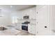 Well-equipped kitchen showcasing stainless steel appliances, ample cabinetry, and elegant countertops at 5311 Meadowland Pkwy, Monroe, NC 28112