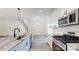 Stylish kitchen with stainless steel appliances, granite countertops, and white cabinetry at 5311 Meadowland Pkwy, Monroe, NC 28112