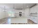 Bright kitchen with island, granite countertops, and stainless steel appliances at 5311 Meadowland Pkwy, Monroe, NC 28112