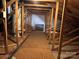 Unfinished attic space with wooden framework and exposed insulation at 5518 Prosperity View Dr, Charlotte, NC 28269