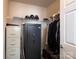 Walk-in closet provides ample storage with shelving and secure storage at 5518 Prosperity View Dr, Charlotte, NC 28269
