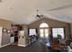 Large lounge featuring a kitchen area, bar seating, and dining tables at 5518 Prosperity View Dr, Charlotte, NC 28269