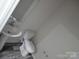 Cozy bathroom with stylish fixtures, pedestal sink, tile flooring and toilet at 586 30Th Avenue Ne Cir, Hickory, NC 28601