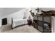 Attic bedroom with sloped ceiling, decor, and natural light at 693 Emerald Shores Rd, Mount Gilead, NC 27306