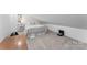 Cozy carpeted bedroom featuring a queen bed and modern decor at 693 Emerald Shores Rd, Mount Gilead, NC 27306