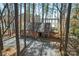 Charming brick home nestled among trees, offering privacy and a serene setting at 693 Emerald Shores Rd, Mount Gilead, NC 27306