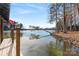 Picturesque waterfront view with a private dock and tranquil water at 693 Emerald Shores Rd, Mount Gilead, NC 27306