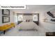This is a luxurious bedroom featuring a plush bed, neutral tones, and ample lighting at 7027 Sylvan Retreat Dr, Denver, NC 28037