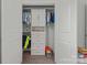 Organized closet with ample storage space including shelves, drawers, and hanging racks at 7127 Chrysanthemum Rd, Lancaster, SC 29720