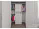 Neatly organized closet with shelving, drawers, and hanging space for clothing storage at 7127 Chrysanthemum Rd, Lancaster, SC 29720