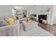 Comfortable living room featuring a fireplace, large sectional sofa, and stylish decor at 7127 Chrysanthemum Rd, Lancaster, SC 29720