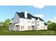 Rear exterior view with large windows providing an abundance of light, attached garage and covered porch looking over a landscaped yard at 7456 Fighting Creek Rd # 40, Sherrills Ford, NC 28673