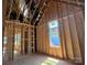 Framing complete in a bedroom, showing window placements and structural details during construction at 7459 Fighting Creek Rd # 33, Sherrills Ford, NC 28673