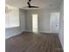 Open concept bonus room features clean, modern design with ample space and natural light at 7459 Fighting Creek Rd # 33, Sherrills Ford, NC 28673