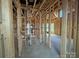 Interior framing shows open layout, plumbing and electrical under construction at 7459 Fighting Creek Rd # 33, Sherrills Ford, NC 28673