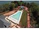 Aerial view of a sparkling community pool and amenity center, perfect for relaxation and recreation at 7459 Fighting Creek Rd # 33, Sherrills Ford, NC 28673